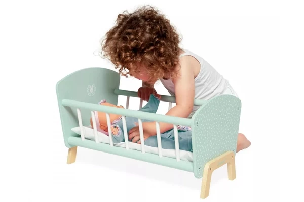 Mintfarbenes Holzpuppenbett