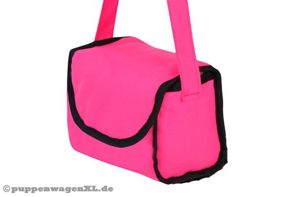 Inklusive farblich passender Wickeltasche.