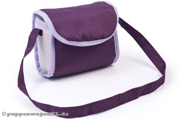 Inklusive farblich passender Wickeltasche.