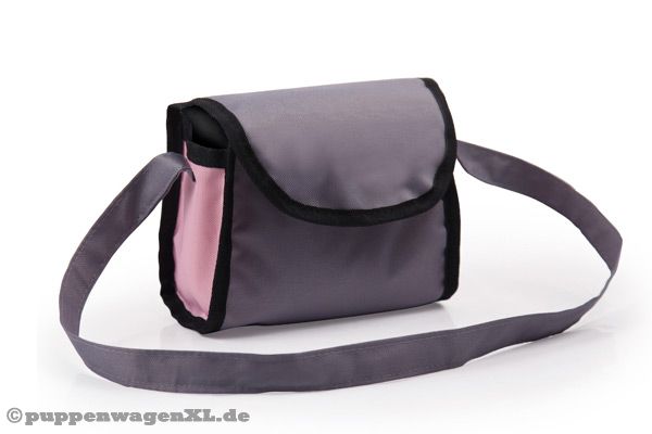 Inklusive farblich passender Wickeltasche.